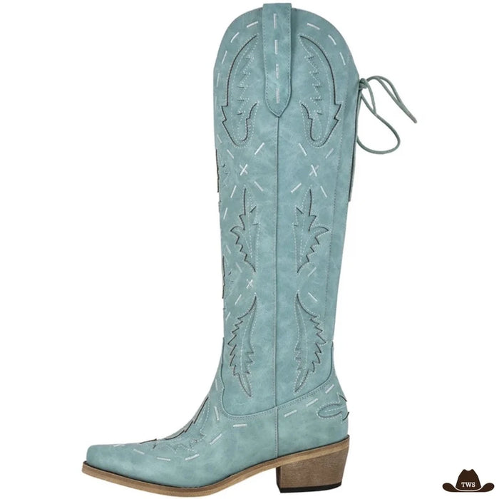 Santiags femme à tige haute, broderies claires en flamme et laçage arrière, coloris turquoise, vue de profil