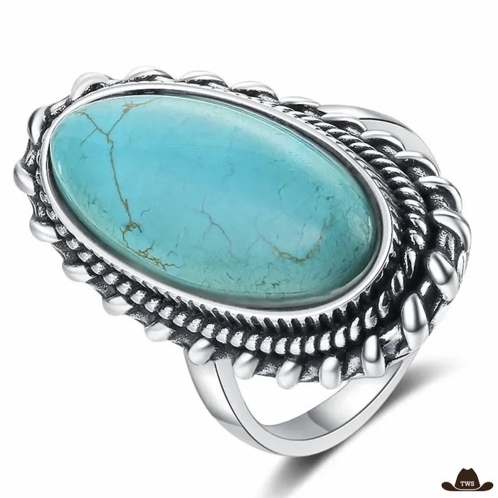 Bague argent turquoise indienne Bordure de feuilles, grand cabochon ovale cerclé d'une torsade et de gouttes d'argent