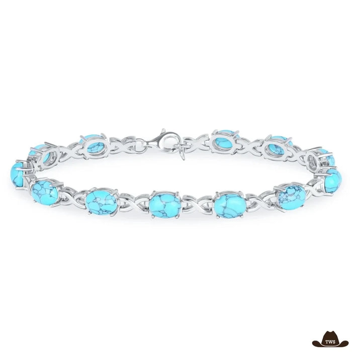 Bracelet pierre turquoise en ligne de cabochons ovales veinés, reliés par des maillons argentés en forme d'infini