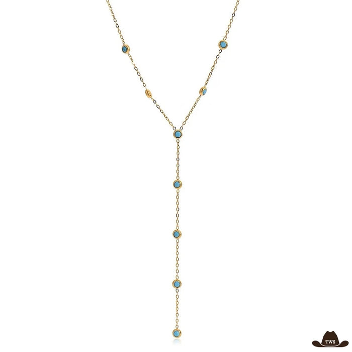 Collier fin turquoise en Y, chaîne dorée ponctuée de petites pierres turquoise rondes et de pastilles dorées