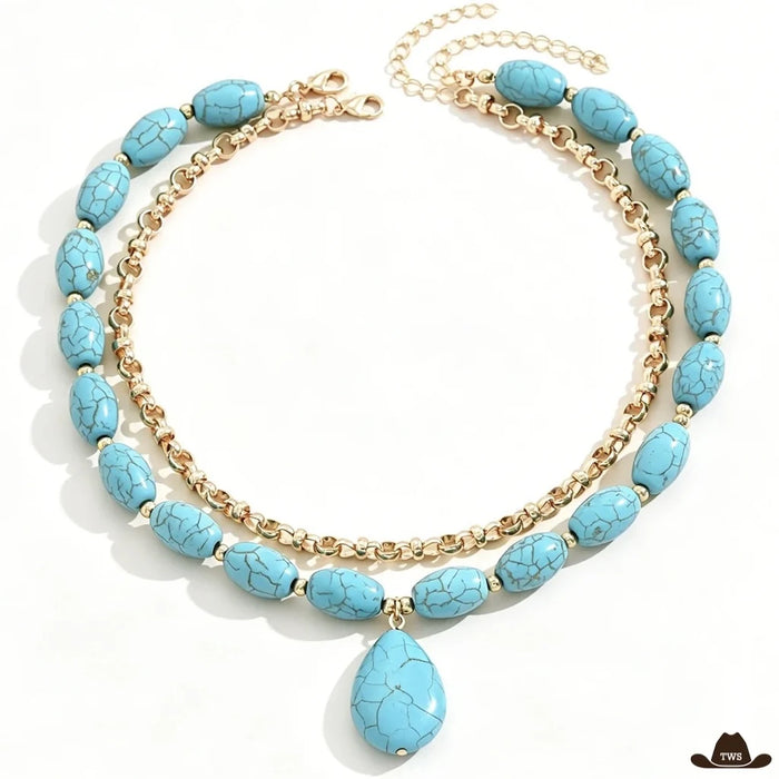 Collier perle turquoise à deux rangs, perles ovales veinées et pendentif en goutte, avec une chaîne dorée à mailles rondes